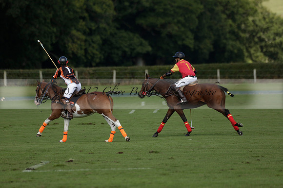 Four Quarters Black (black) v BHC (red) in a Autumn Cup polo match on Ambersham 2 at Cowdray Park Polo Club on Friday 20 September 2013 www.polopictures.co.uk