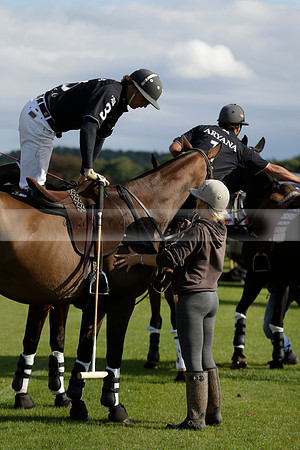 Aryana (black) v Shoreline (yellow) in a Farewell Cup polo match played on Ambersham 5 at Cowdray Park Polo Club on Wednesday 18 September 2013. www.polopictures.co.uk