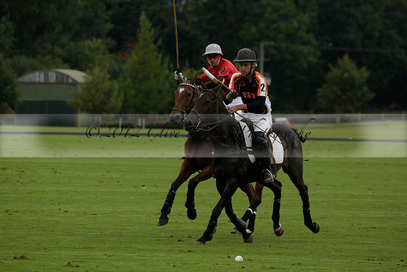 Four Quarters Black (black) v Clashleigh (red)in a Jaeger Le Coultre Autumn Cup polo match played on Ambersham 2 at Cowdray Park Polo Club on Wednesday 2013.09.11 www.polopictures.co.uk