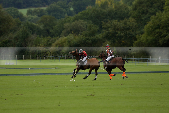 Four Quarters Black (black) v Clashleigh (red) in the Autumn Cup subsidiary final polo match on Ambersham 2 at Cowdray Park Polo Club on Sunday 22 September 2013 www.polopictures.co.uk