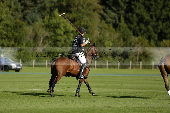 Aryana (black) v Shoreline (yellow) in a Farewell Cup polo match played on Ambersham 5 at Cowdray Park Polo Club on Wednesday 18 September 2013. www.polopictures.co.uk