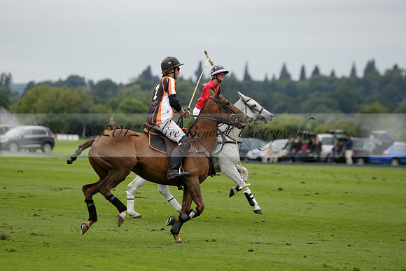 Four Quarters Black (black) v Clashleigh (red) in the Autumn Cup subsidiary final polo match on Ambersham 2 at Cowdray Park Polo Club on Sunday 22 September 2013 www.polopictures.co.uk