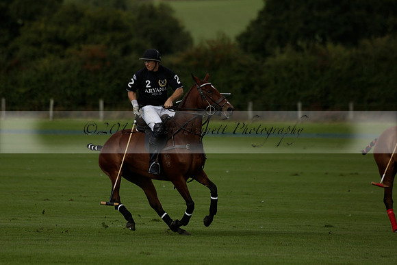 Aryana (black) v Shoreline (yellow) in a Farewell Cup polo match played on Ambersham 5 at Cowdray Park Polo Club on Wednesday 18 September 2013. www.polopictures.co.uk