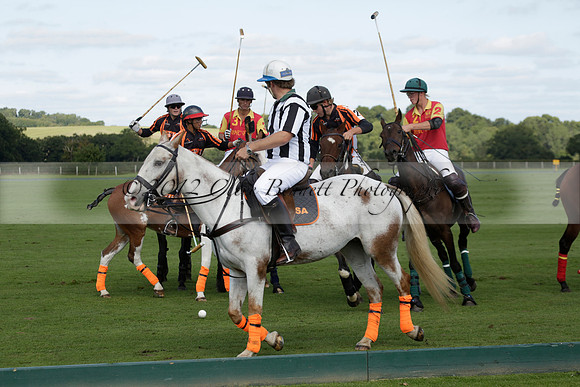 Four Quarters Black (black) v BHC (red) in a Autumn Cup polo match on Ambersham 2 at Cowdray Park Polo Club on Friday 20 September 2013 www.polopictures.co.uk