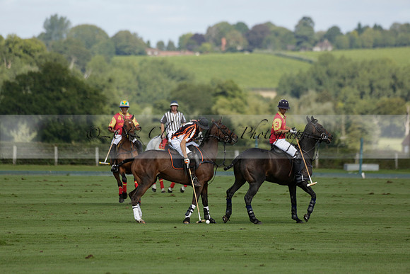 Four Quarters Black (black) v BHC (red) in a Autumn Cup polo match on Ambersham 2 at Cowdray Park Polo Club on Friday 20 September 2013 www.polopictures.co.uk