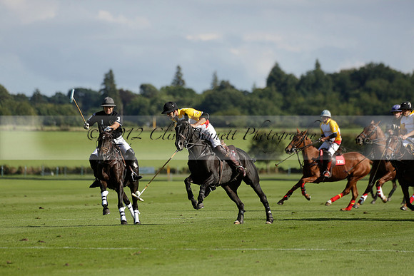 Aryana (black) v Shoreline (yellow) in a Farewell Cup polo match played on Ambersham 5 at Cowdray Park Polo Club on Wednesday 18 September 2013. www.polopictures.co.uk