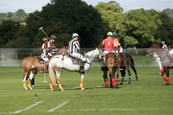 Four Quarters Black (black) v BHC (red) in a Autumn Cup polo match on Ambersham 2 at Cowdray Park Polo Club on Friday 20 September 2013 www.polopictures.co.uk
