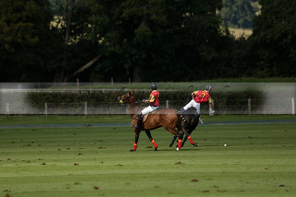 Four Quarters Black (black) v BHC (red) in a Autumn Cup polo match on Ambersham 2 at Cowdray Park Polo Club on Friday 20 September 2013 www.polopictures.co.uk