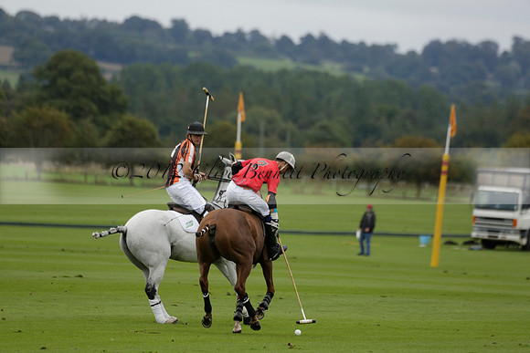 Four Quarters Black (black) v Clashleigh (red) in the Autumn Cup subsidiary final polo match on Ambersham 2 at Cowdray Park Polo Club on Sunday 22 September 2013 www.polopictures.co.uk
