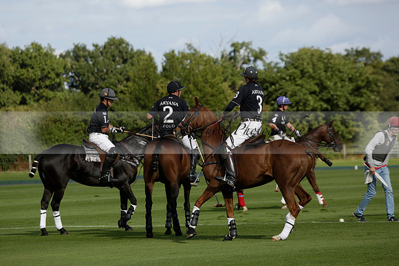 Aryana (black) v Shoreline (yellow) in a Farewell Cup polo match played on Ambersham 5 at Cowdray Park Polo Club on Wednesday 18 September 2013. www.polopictures.co.uk