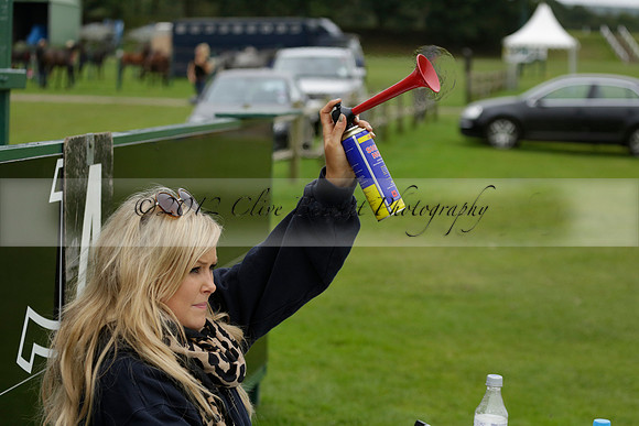 Four Quarters Black (black) v Clashleigh (red) in the Autumn Cup subsidiary final polo match on Ambersham 2 at Cowdray Park Polo Club on Sunday 22 September 2013 www.polopictures.co.uk