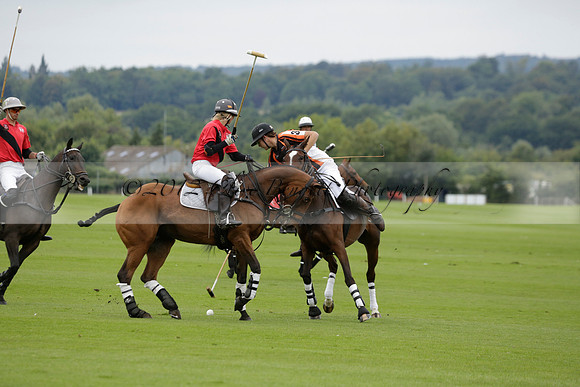 Four Quarters Black (black) v Clashleigh (red) in the Autumn Cup subsidiary final polo match on Ambersham 2 at Cowdray Park Polo Club on Sunday 22 September 2013 www.polopictures.co.uk
