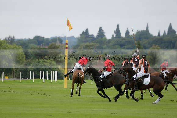 Four Quarters Black (black) v Clashleigh (red) in the Autumn Cup subsidiary final polo match on Ambersham 2 at Cowdray Park Polo Club on Sunday 22 September 2013 www.polopictures.co.uk