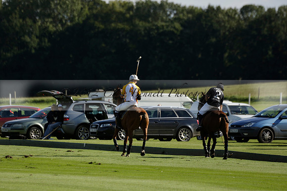 Aryana (black) v Shoreline (yellow) in a Farewell Cup polo match played on Ambersham 5 at Cowdray Park Polo Club on Wednesday 18 September 2013. www.polopictures.co.uk