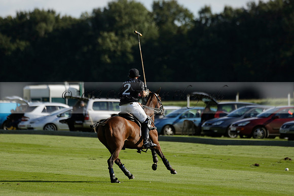 Aryana (black) v Shoreline (yellow) in a Farewell Cup polo match played on Ambersham 5 at Cowdray Park Polo Club on Wednesday 18 September 2013. www.polopictures.co.uk