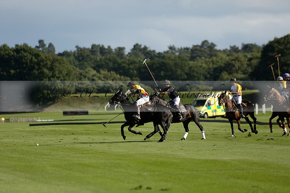 Aryana (black) v Shoreline (yellow) in a Farewell Cup polo match played on Ambersham 5 at Cowdray Park Polo Club on Wednesday 18 September 2013. www.polopictures.co.uk