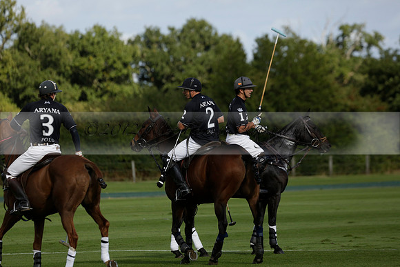 Aryana (black) v Shoreline (yellow) in a Farewell Cup polo match played on Ambersham 5 at Cowdray Park Polo Club on Wednesday 18 September 2013. www.polopictures.co.uk
