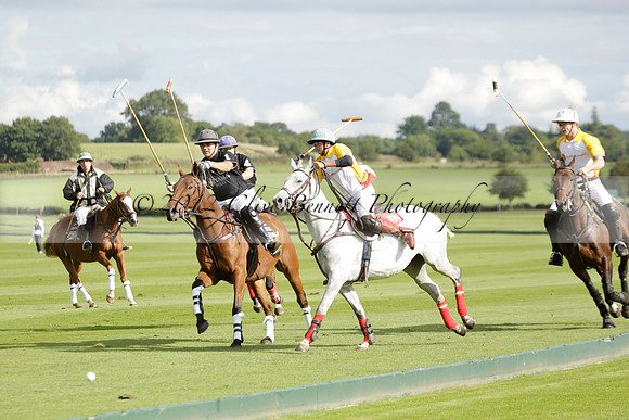 Aryana (black) v Shoreline (yellow) in a Farewell Cup polo match played on Ambersham 5 at Cowdray Park Polo Club on Wednesday 18 September 2013. www.polopictures.co.uk