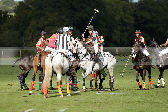 Four Quarters Black (black) v BHC (red) in a Autumn Cup polo match on Ambersham 2 at Cowdray Park Polo Club on Friday 20 September 2013 www.polopictures.co.uk