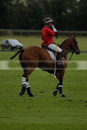 Four Quarters Black (black) v Clashleigh (red)in a Jaeger Le Coultre Autumn Cup polo match played on Ambersham 2 at Cowdray Park Polo Club on Wednesday 2013.09.11 www.polopictures.co.uk