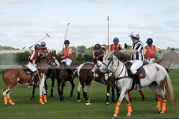 Four Quarters Black (black) v BHC (red) in a Autumn Cup polo match on Ambersham 2 at Cowdray Park Polo Club on Friday 20 September 2013 www.polopictures.co.uk