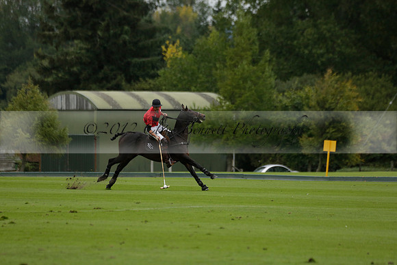 Four Quarters Black (black) v Clashleigh (red) in the Autumn Cup subsidiary final polo match on Ambersham 2 at Cowdray Park Polo Club on Sunday 22 September 2013 www.polopictures.co.uk