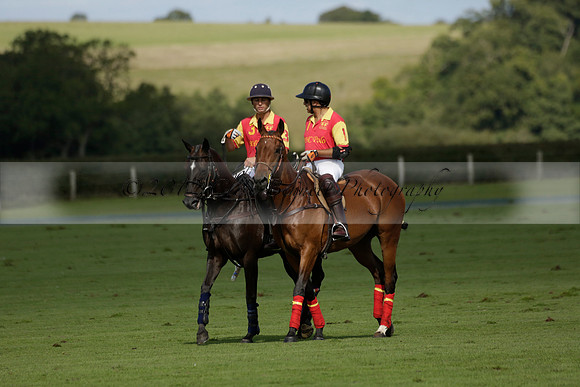 Four Quarters Black (black) v BHC (red) in a Autumn Cup polo match on Ambersham 2 at Cowdray Park Polo Club on Friday 20 September 2013 www.polopictures.co.uk