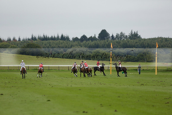 Four Quarters Black (black) v Clashleigh (red) in the Autumn Cup subsidiary final polo match on Ambersham 2 at Cowdray Park Polo Club on Sunday 22 September 2013 www.polopictures.co.uk