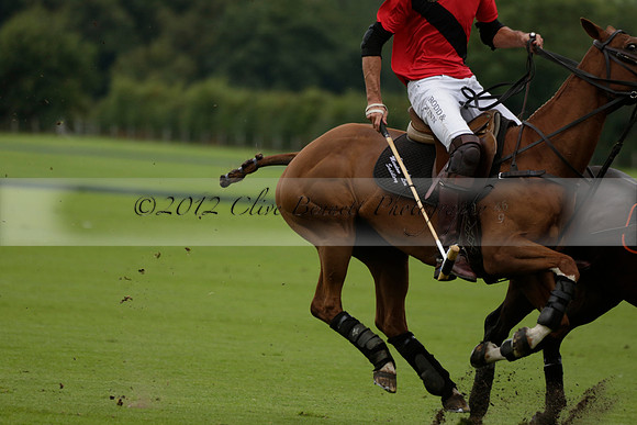 Four Quarters Black (black) v Clashleigh (red) in the Autumn Cup subsidiary final polo match on Ambersham 2 at Cowdray Park Polo Club on Sunday 22 September 2013 www.polopictures.co.uk
