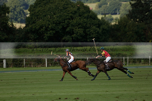 Four Quarters Black (black) v BHC (red) in a Autumn Cup polo match on Ambersham 2 at Cowdray Park Polo Club on Friday 20 September 2013 www.polopictures.co.uk