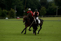 Four Quarters Black (black) v Clashleigh (red)in a Jaeger Le Coultre Autumn Cup polo match played on Ambersham 2 at Cowdray Park Polo Club on Wednesday 2013.09.11 www.polopictures.co.uk