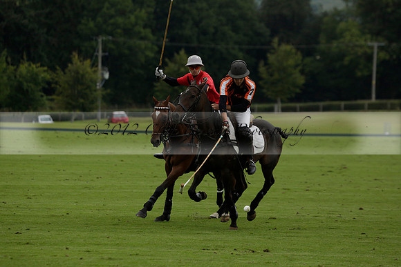 Four Quarters Black (black) v Clashleigh (red)in a Jaeger Le Coultre Autumn Cup polo match played on Ambersham 2 at Cowdray Park Polo Club on Wednesday 2013.09.11 www.polopictures.co.uk