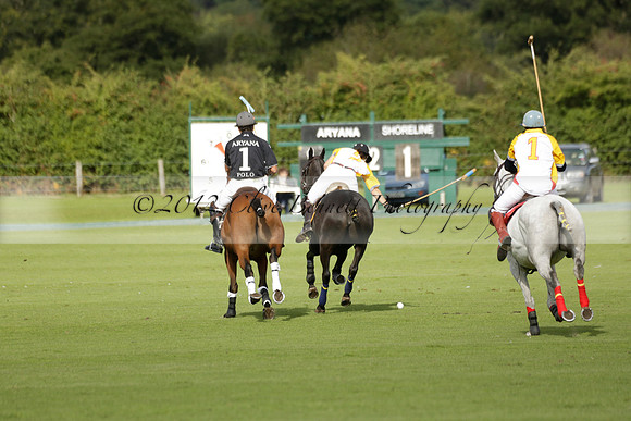 Aryana (black) v Shoreline (yellow) in a Farewell Cup polo match played on Ambersham 5 at Cowdray Park Polo Club on Wednesday 18 September 2013. www.polopictures.co.uk