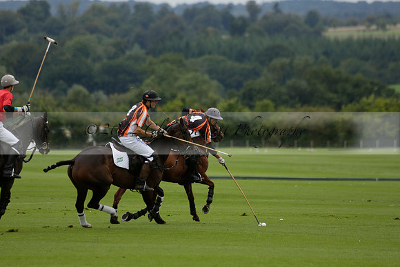Four Quarters Black (black) v Clashleigh (red) in the Autumn Cup subsidiary final polo match on Ambersham 2 at Cowdray Park Polo Club on Sunday 22 September 2013 www.polopictures.co.uk