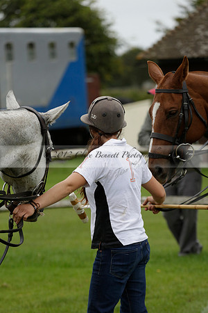 Four Quarters Black (black) v Clashleigh (red) in the Autumn Cup subsidiary final polo match on Ambersham 2 at Cowdray Park Polo Club on Sunday 22 September 2013 www.polopictures.co.uk