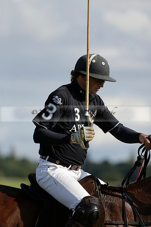 Aryana (black) v Shoreline (yellow) in a Farewell Cup polo match played on Ambersham 5 at Cowdray Park Polo Club on Wednesday 18 September 2013. www.polopictures.co.uk