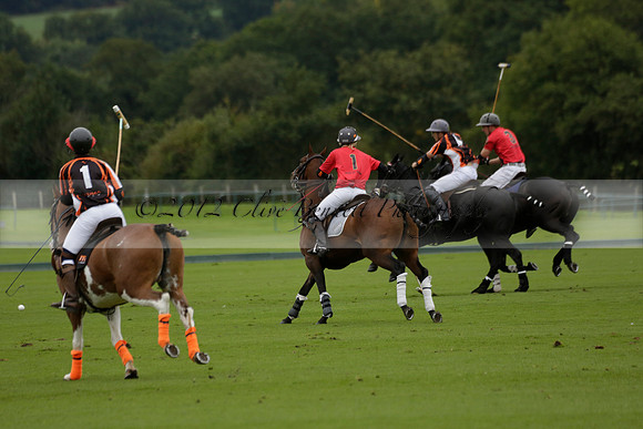 Four Quarters Black (black) v Clashleigh (red) in the Autumn Cup subsidiary final polo match on Ambersham 2 at Cowdray Park Polo Club on Sunday 22 September 2013 www.polopictures.co.uk