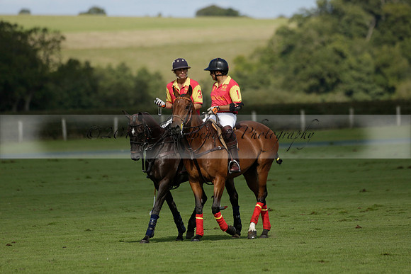 Four Quarters Black (black) v BHC (red) in a Autumn Cup polo match on Ambersham 2 at Cowdray Park Polo Club on Friday 20 September 2013 www.polopictures.co.uk