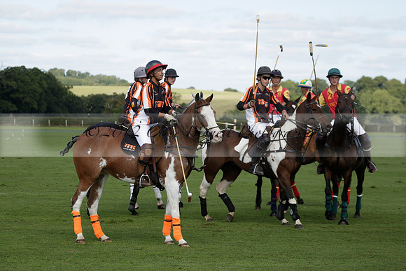 Four Quarters Black (black) v BHC (red) in a Autumn Cup polo match on Ambersham 2 at Cowdray Park Polo Club on Friday 20 September 2013 www.polopictures.co.uk