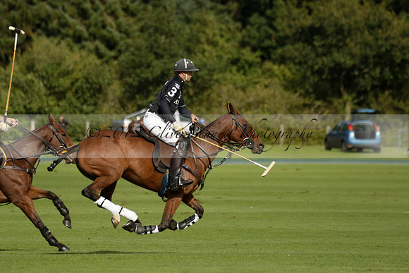 Aryana (black) v Shoreline (yellow) in a Farewell Cup polo match played on Ambersham 5 at Cowdray Park Polo Club on Wednesday 18 September 2013. www.polopictures.co.uk