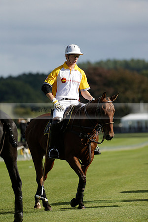 Aryana (black) v Shoreline (yellow) in a Farewell Cup polo match played on Ambersham 5 at Cowdray Park Polo Club on Wednesday 18 September 2013. www.polopictures.co.uk