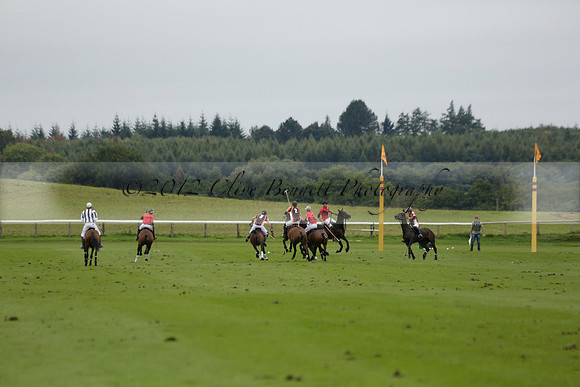 Four Quarters Black (black) v Clashleigh (red) in the Autumn Cup subsidiary final polo match on Ambersham 2 at Cowdray Park Polo Club on Sunday 22 September 2013 www.polopictures.co.uk