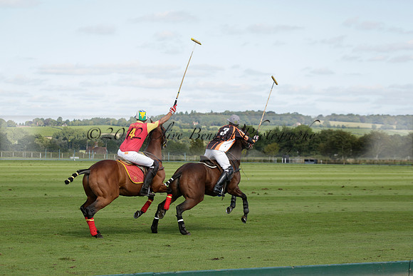 Four Quarters Black (black) v BHC (red) in a Autumn Cup polo match on Ambersham 2 at Cowdray Park Polo Club on Friday 20 September 2013 www.polopictures.co.uk