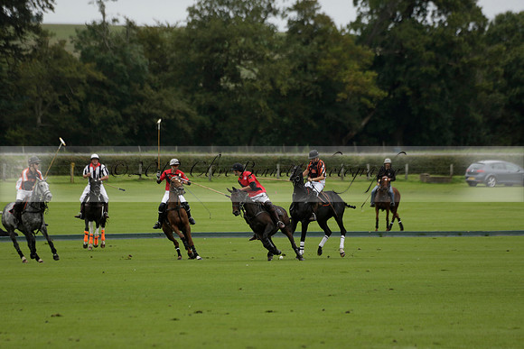 Four Quarters Black (black) v Clashleigh (red) in the Autumn Cup subsidiary final polo match on Ambersham 2 at Cowdray Park Polo Club on Sunday 22 September 2013 www.polopictures.co.uk