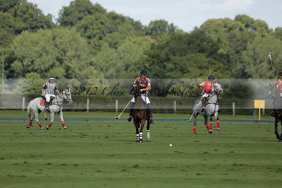 Four Quarters Black (black) v BHC (red) in a Autumn Cup polo match on Ambersham 2 at Cowdray Park Polo Club on Friday 20 September 2013 www.polopictures.co.uk