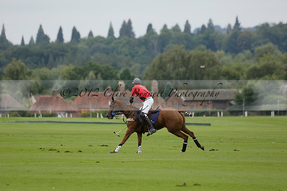 Four Quarters Black (black) v Clashleigh (red) in the Autumn Cup subsidiary final polo match on Ambersham 2 at Cowdray Park Polo Club on Sunday 22 September 2013 www.polopictures.co.uk