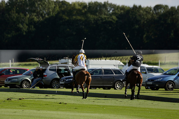 Aryana (black) v Shoreline (yellow) in a Farewell Cup polo match played on Ambersham 5 at Cowdray Park Polo Club on Wednesday 18 September 2013. www.polopictures.co.uk