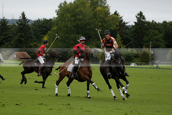 Four Quarters Black (black) v Clashleigh (red) in the Autumn Cup subsidiary final polo match on Ambersham 2 at Cowdray Park Polo Club on Sunday 22 September 2013 www.polopictures.co.uk