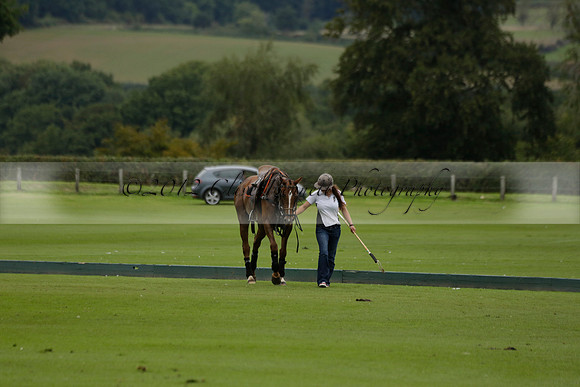 Four Quarters Black (black) v Clashleigh (red) in the Autumn Cup subsidiary final polo match on Ambersham 2 at Cowdray Park Polo Club on Sunday 22 September 2013 www.polopictures.co.uk