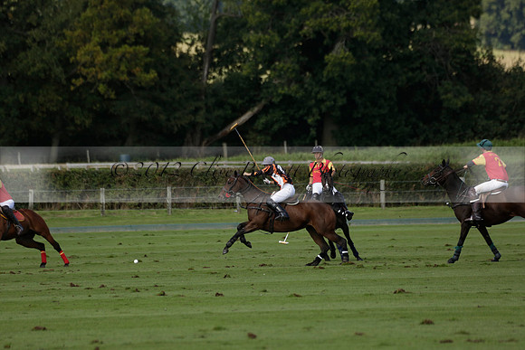 Four Quarters Black (black) v BHC (red) in a Autumn Cup polo match on Ambersham 2 at Cowdray Park Polo Club on Friday 20 September 2013 www.polopictures.co.uk